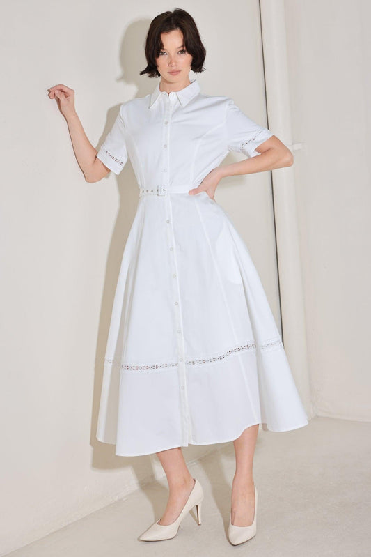 a woman in a white dress