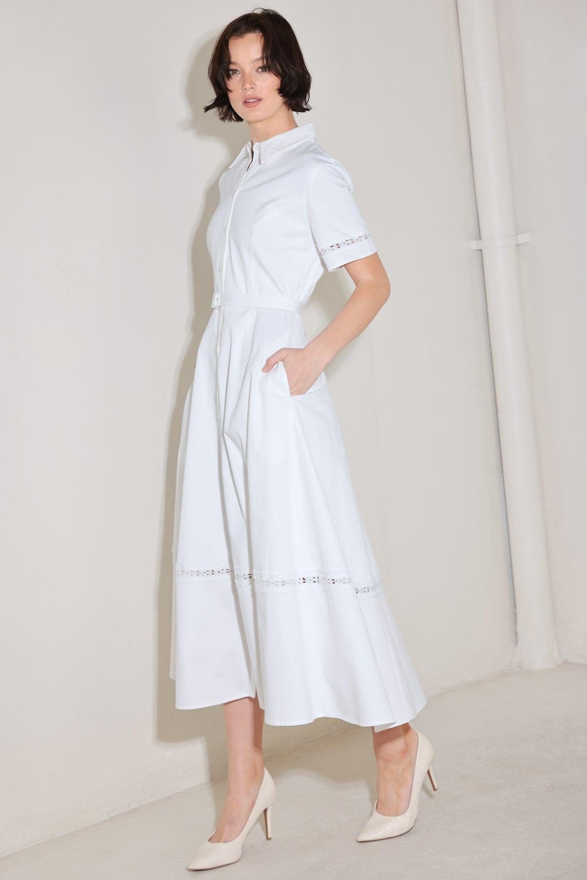 a woman in a white dress