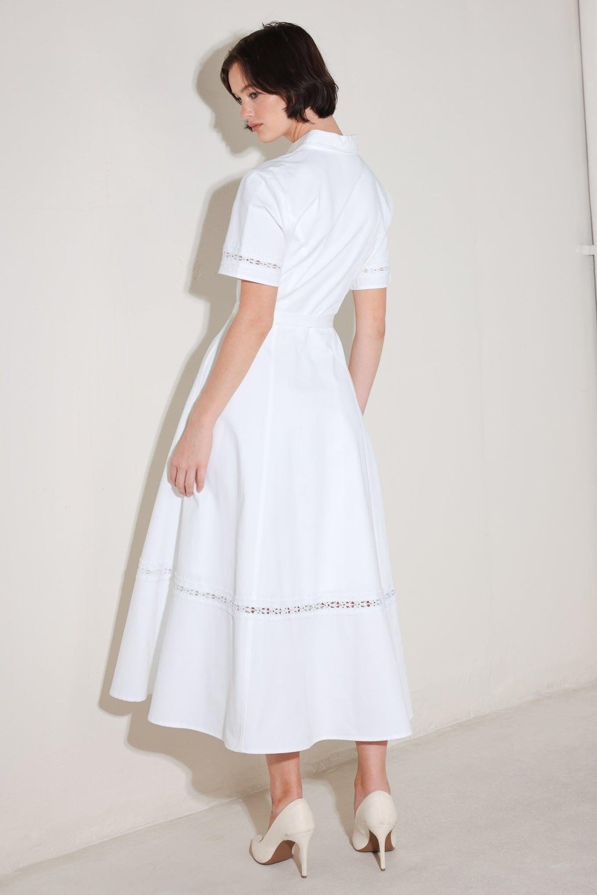 a woman in a white dress
