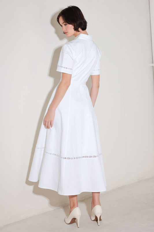 a woman in a white dress