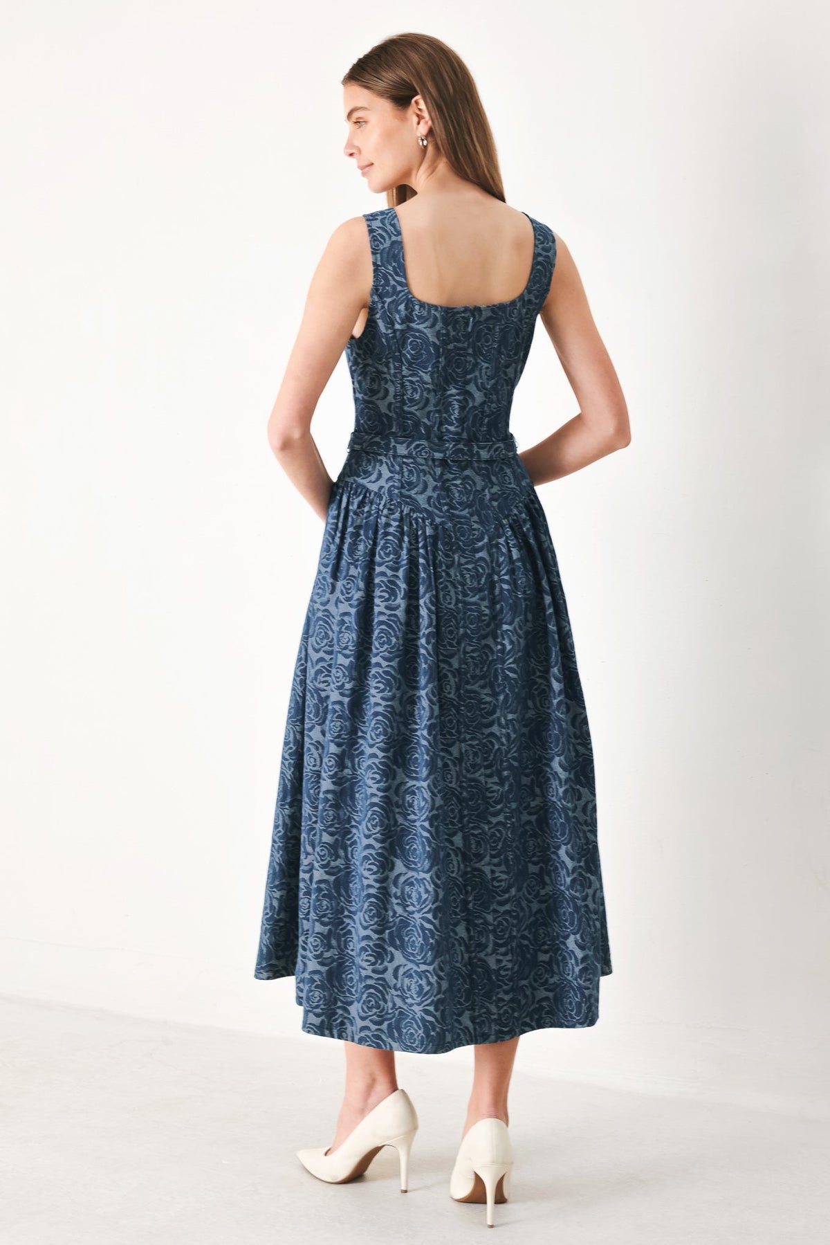 a woman in a blue dress