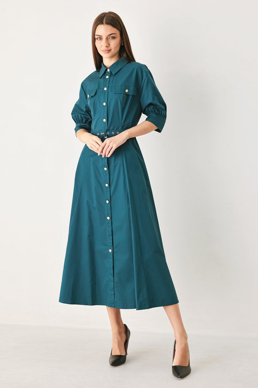 a woman in a long dress