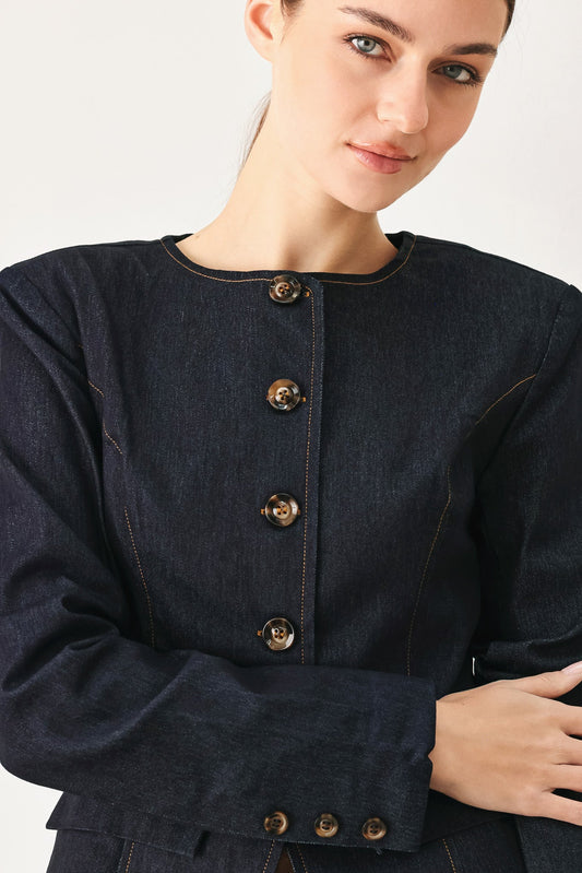 a woman with her arms crossed