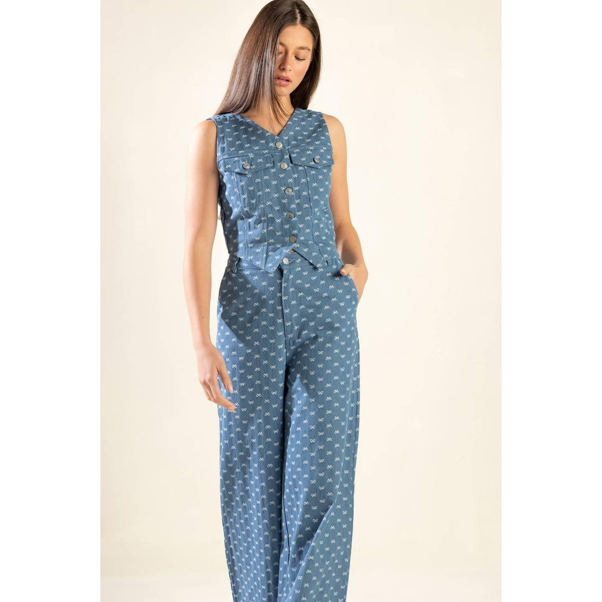 a woman in a blue jumpsuit
