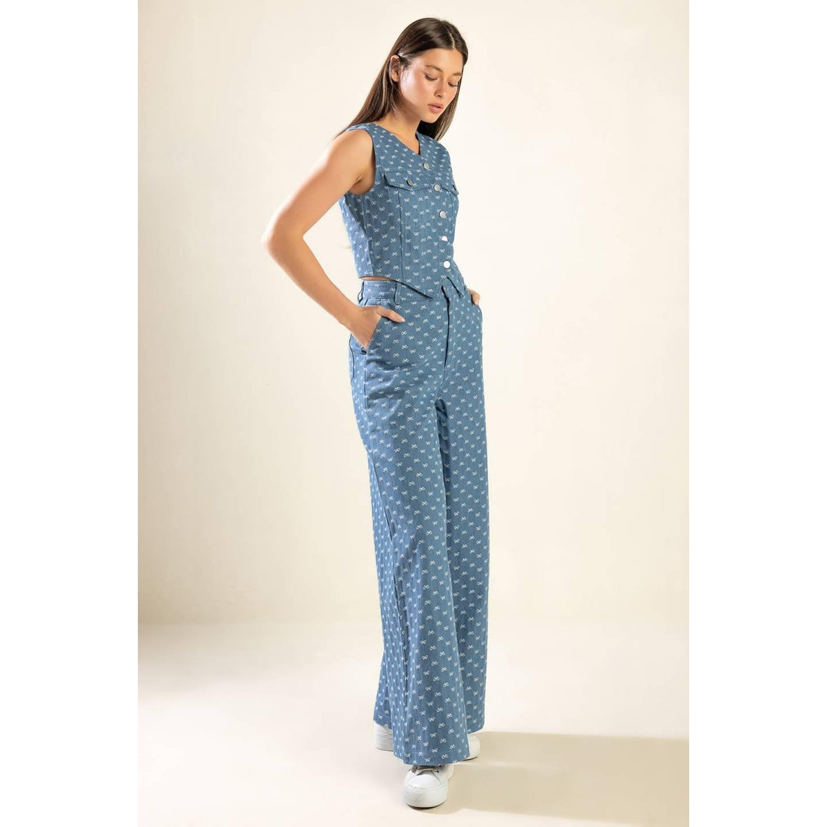 a woman in a blue jumpsuit