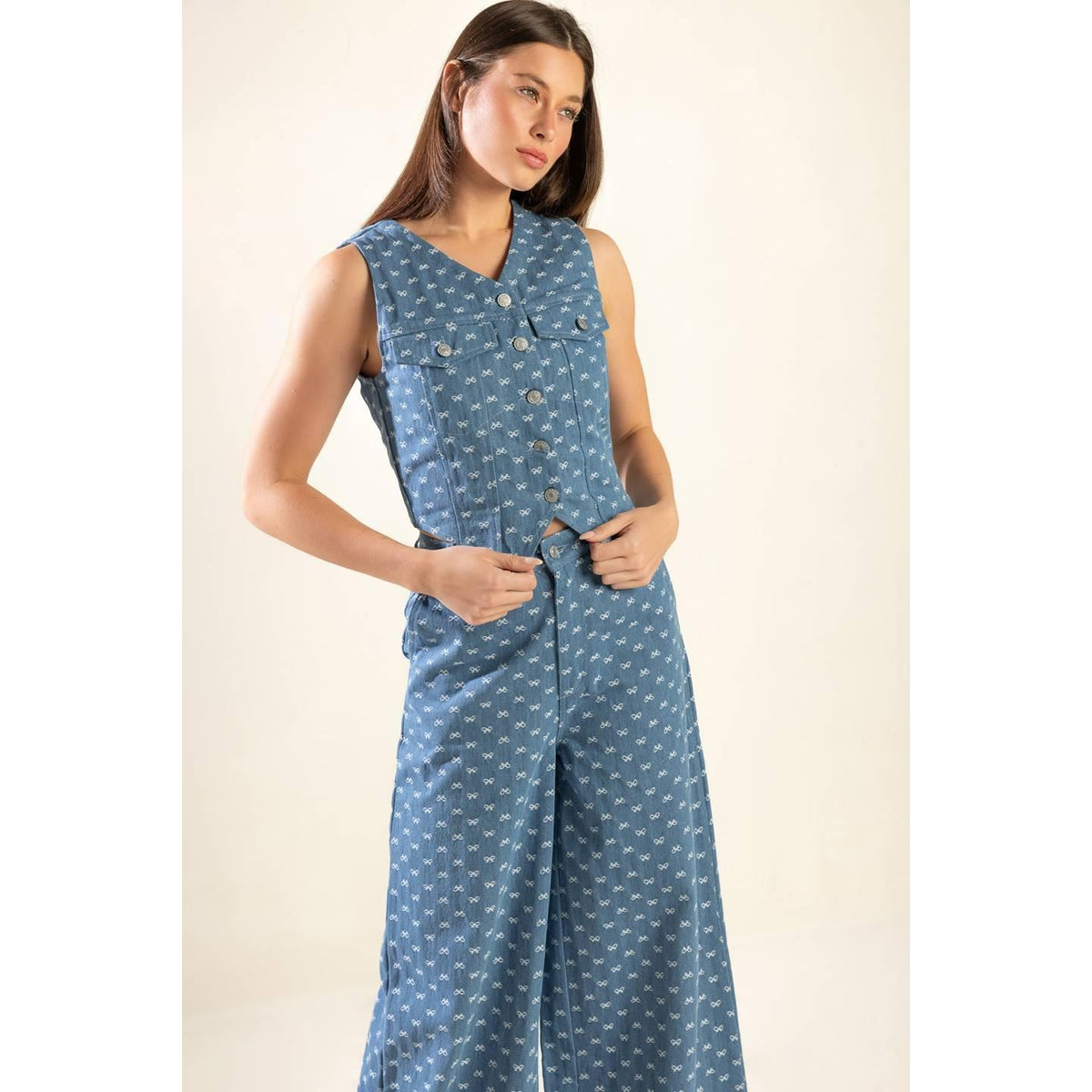 a woman in a blue jumpsuit