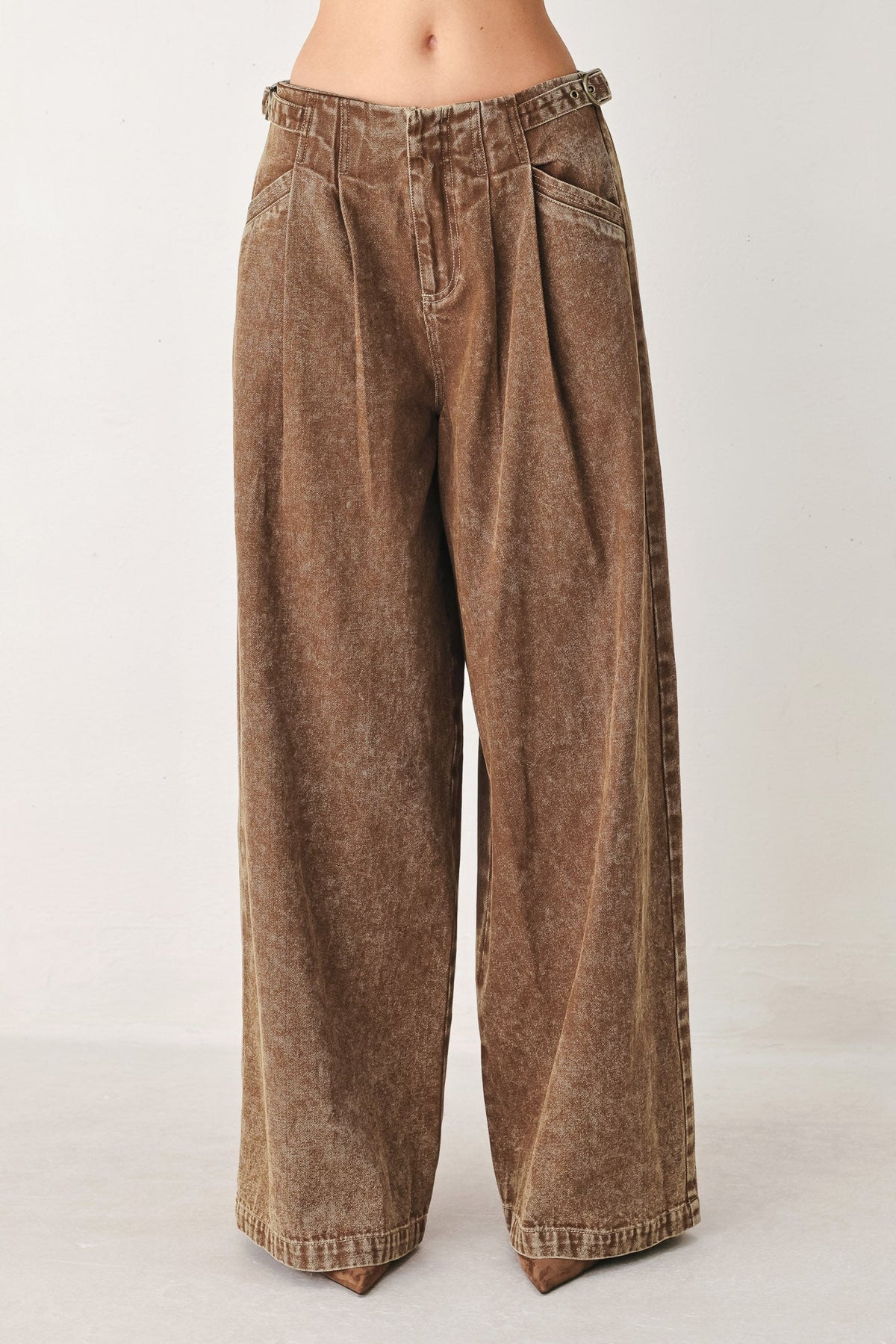 a person wearing brown pants