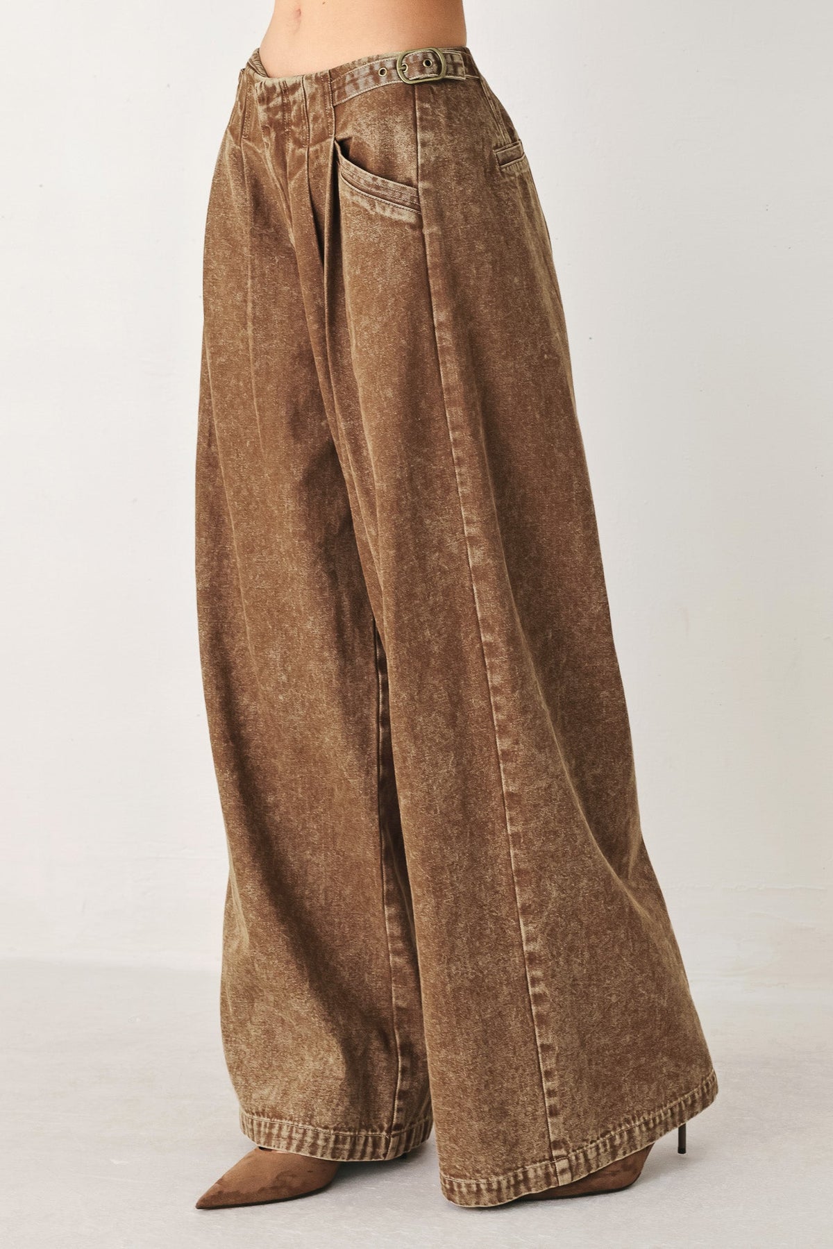 a person wearing brown pants