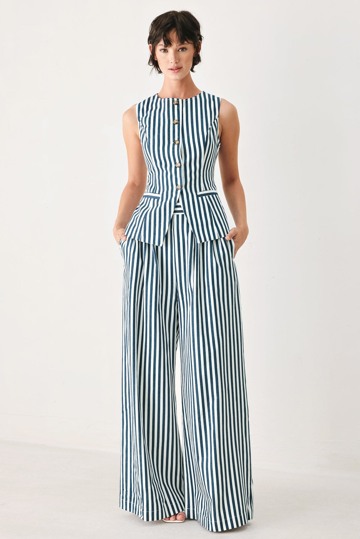 a woman in a striped outfit