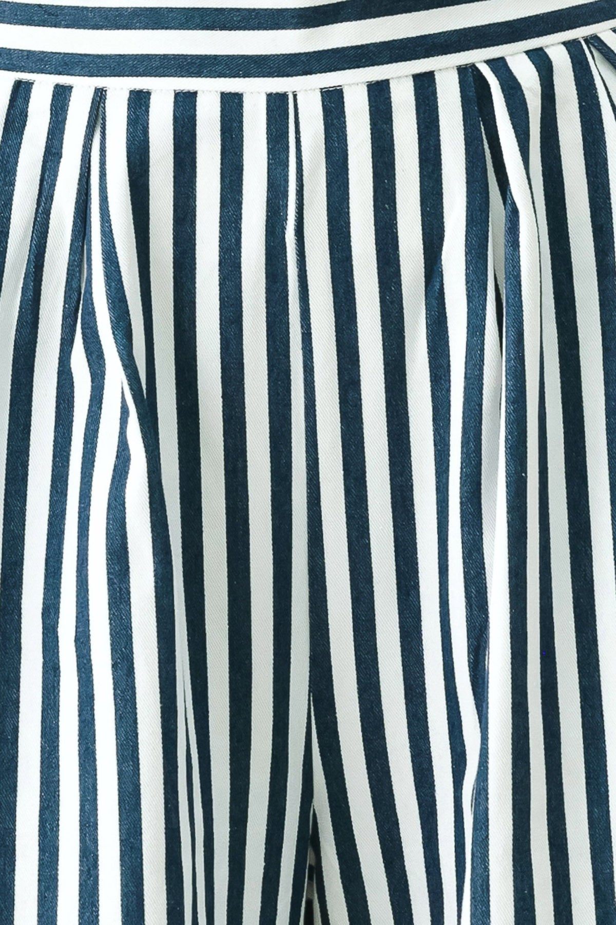 a close up of a blue and white striped fabric