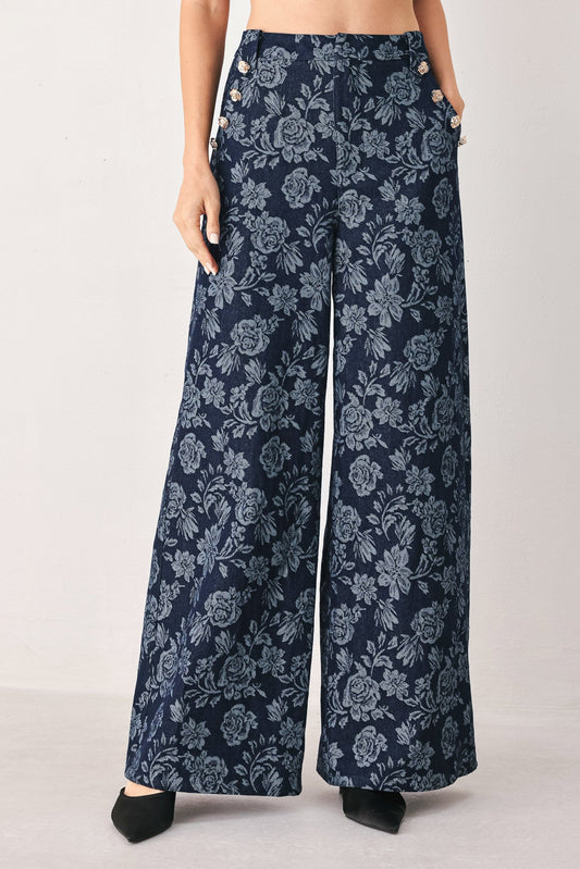 a person wearing a floral pants