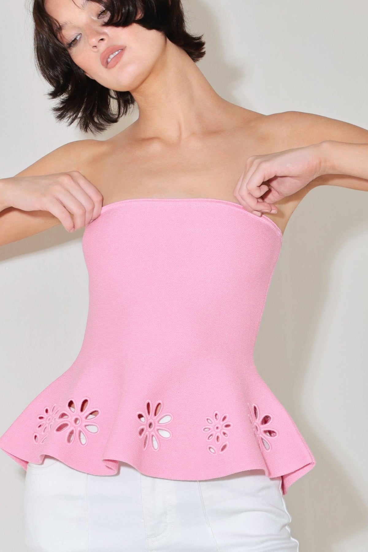 a woman in a pink dress