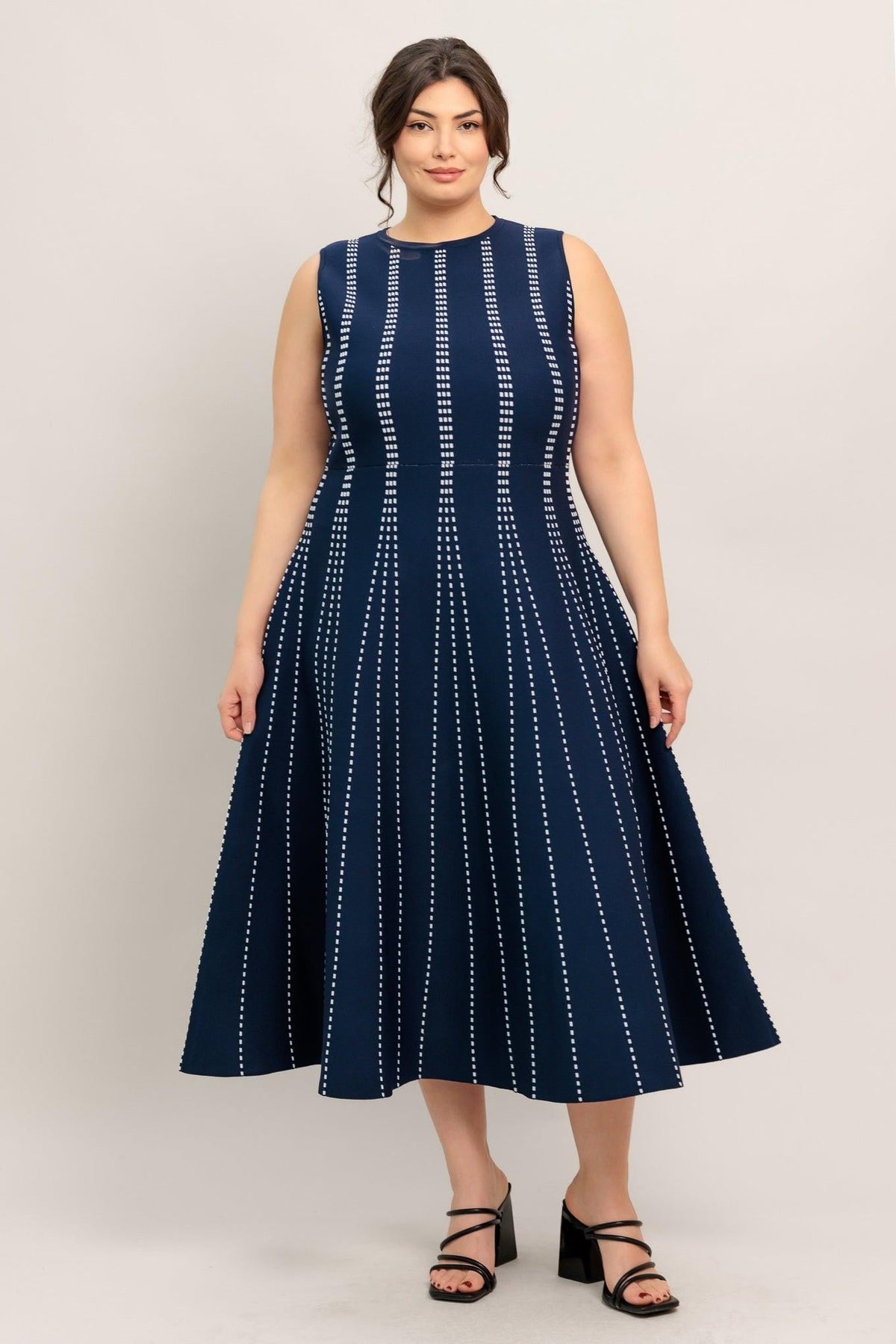 a woman in a blue dress