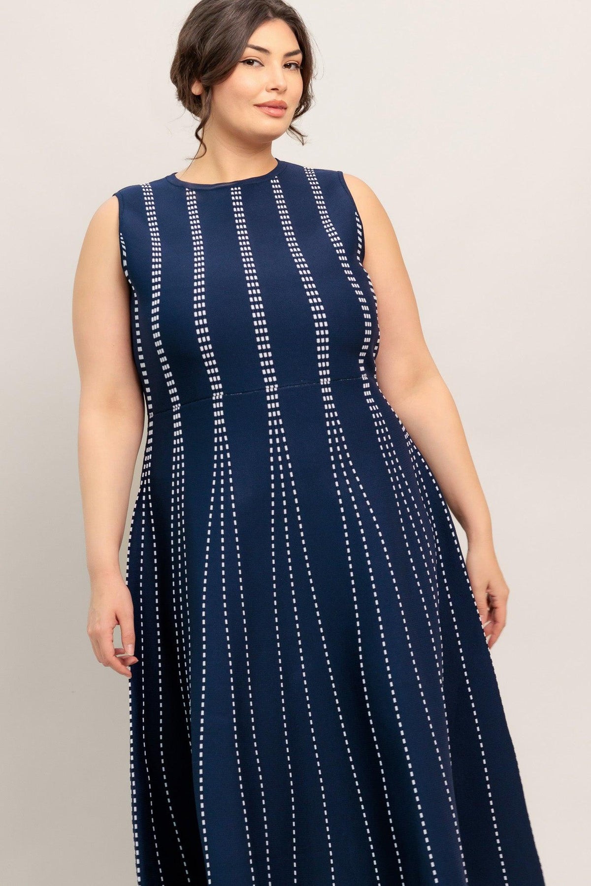 a woman in a blue dress