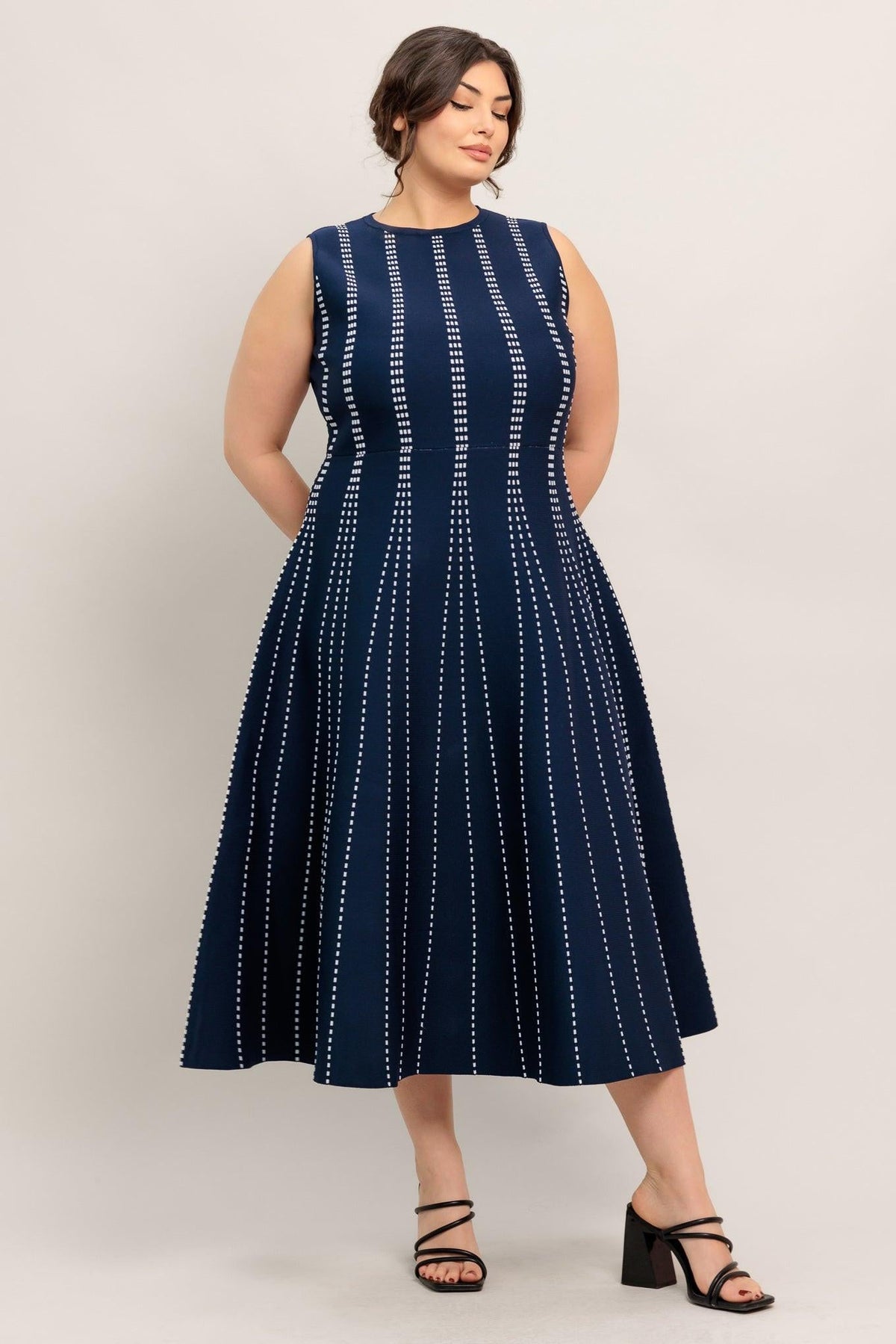 a woman in a blue dress