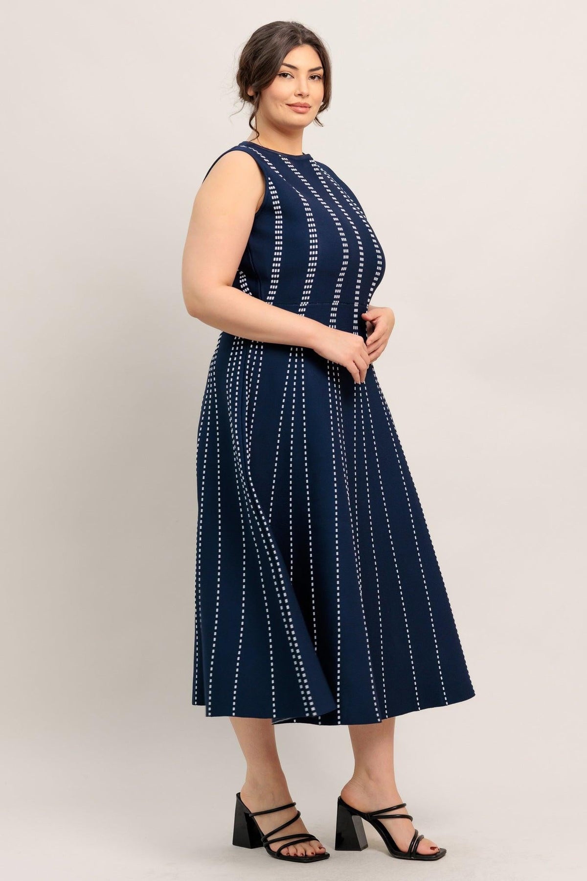 a woman in a blue dress