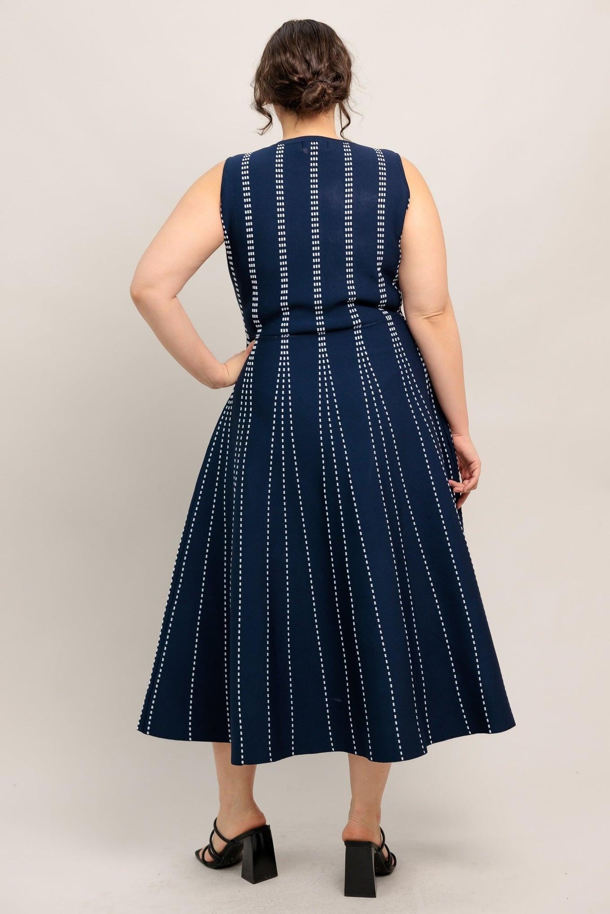 a woman in a blue dress