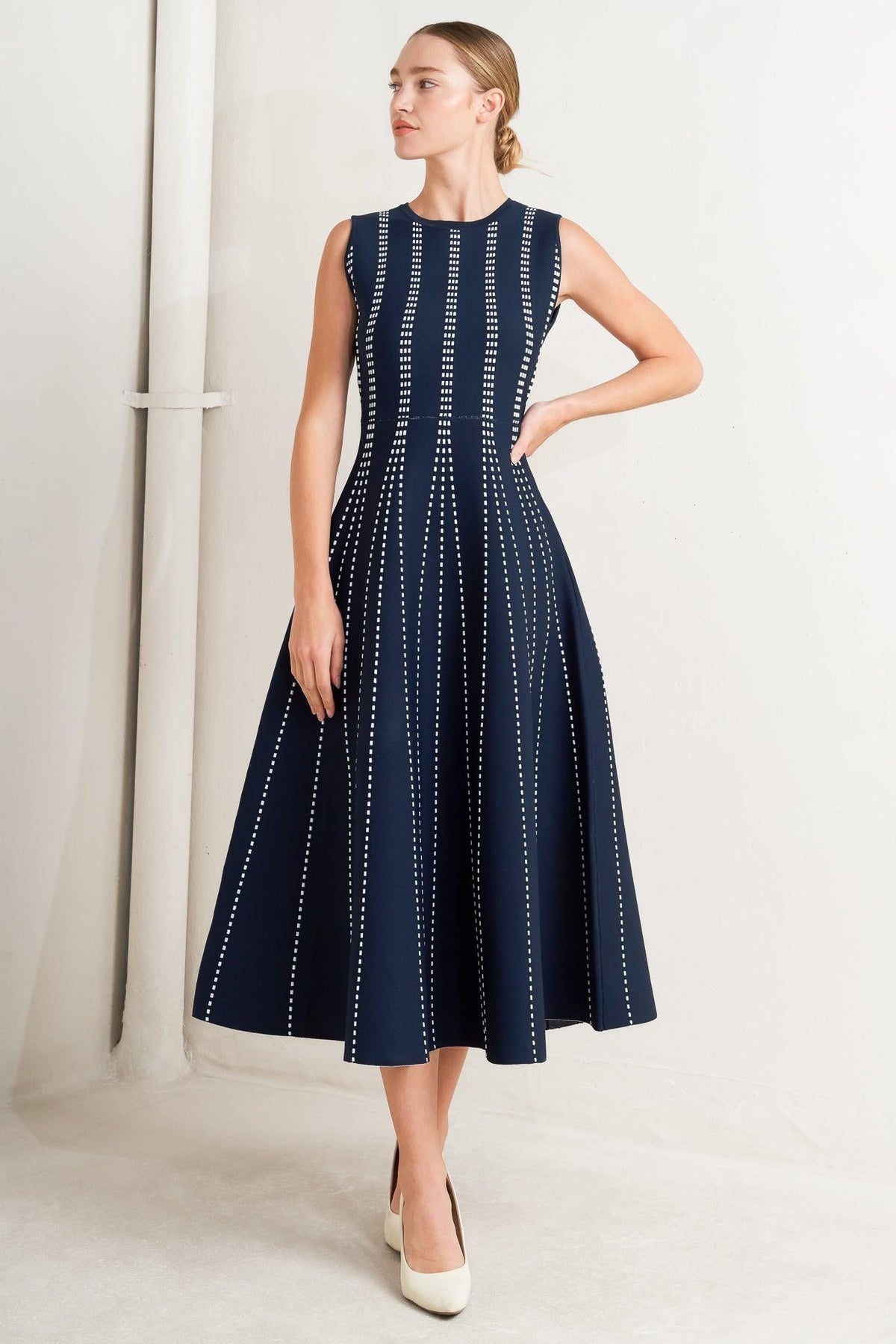 a woman in a blue dress