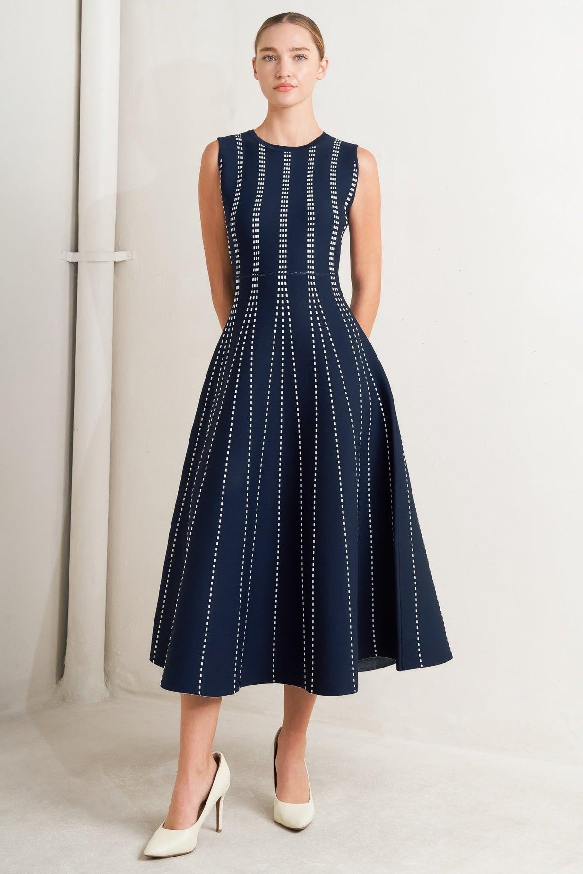 a woman in a blue dress