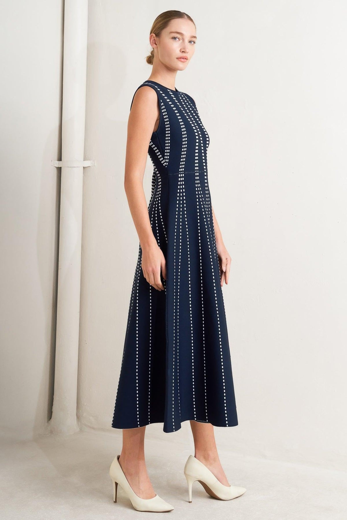 a woman in a blue dress