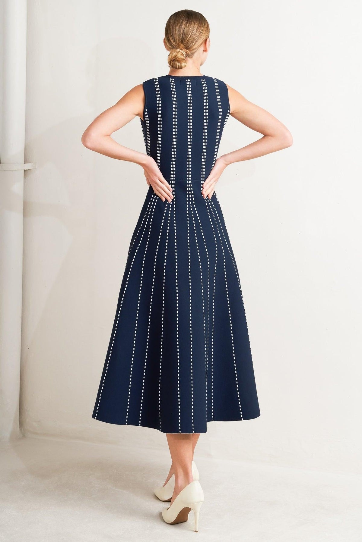 a woman in a blue dress