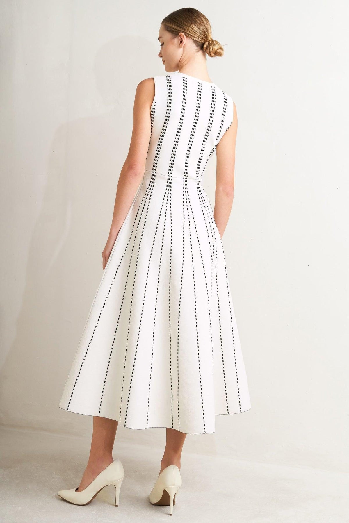 a woman in a white dress