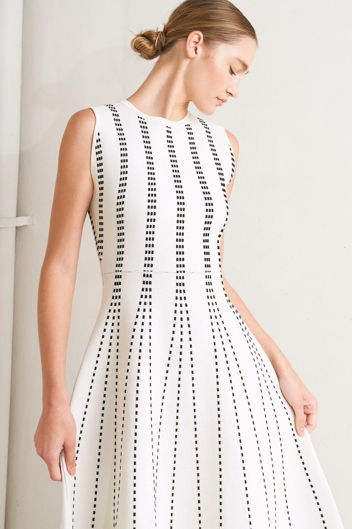a woman in a white dress