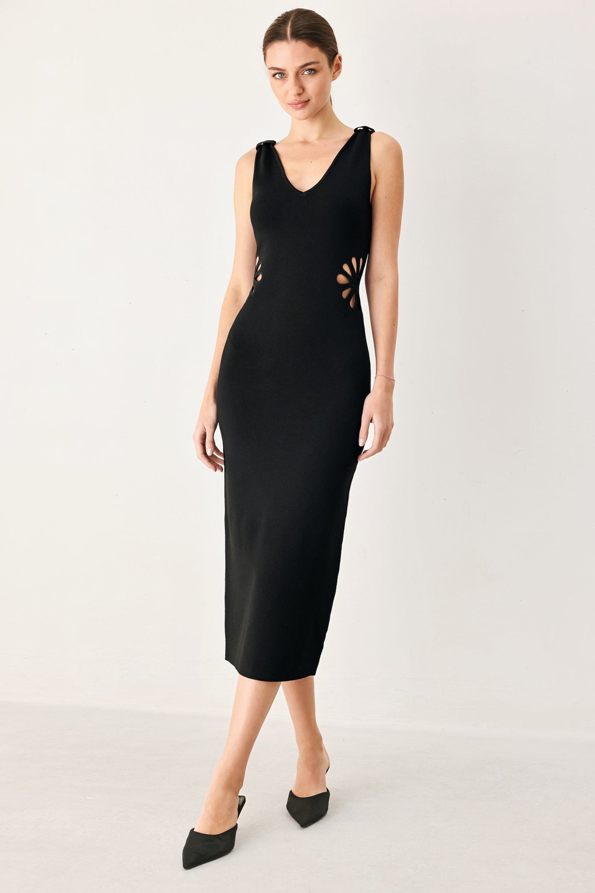 a woman in a black dress