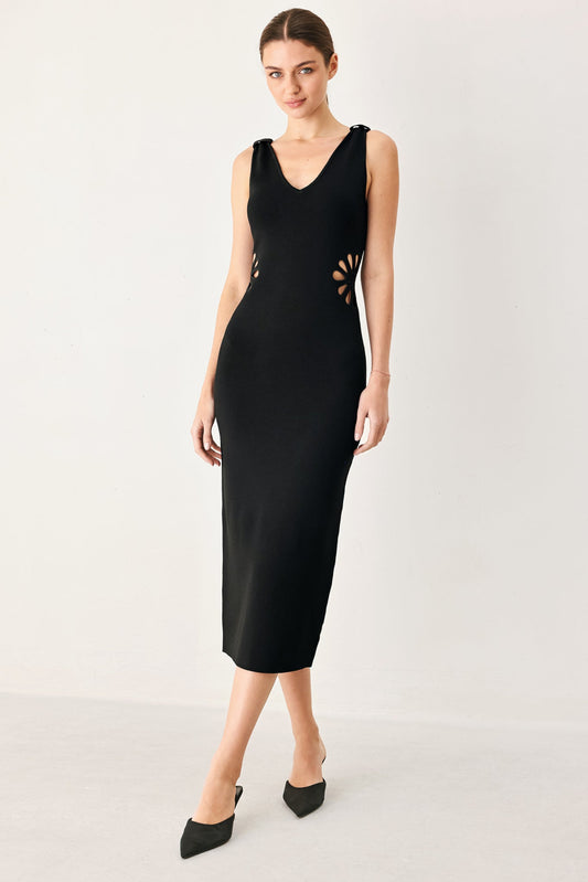 a woman in a black dress