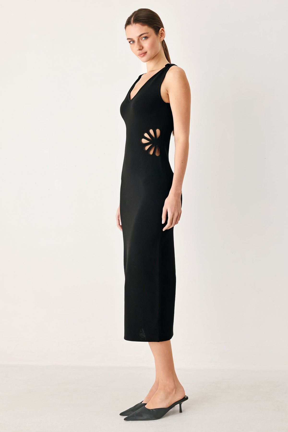 a woman in a black dress