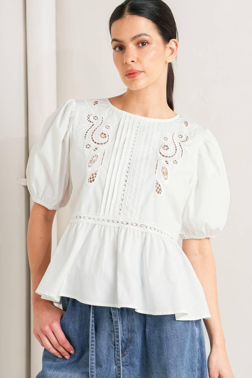 a woman in a white blouse