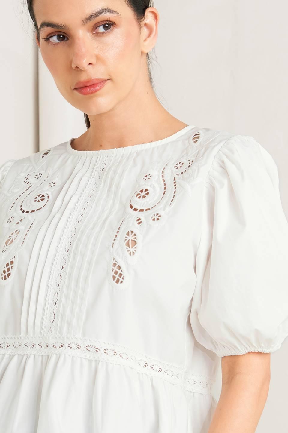 a woman in a white dress