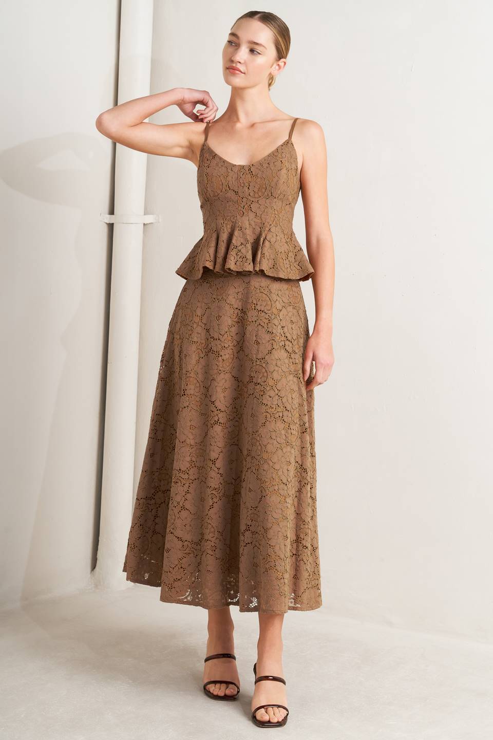 a woman in a brown dress