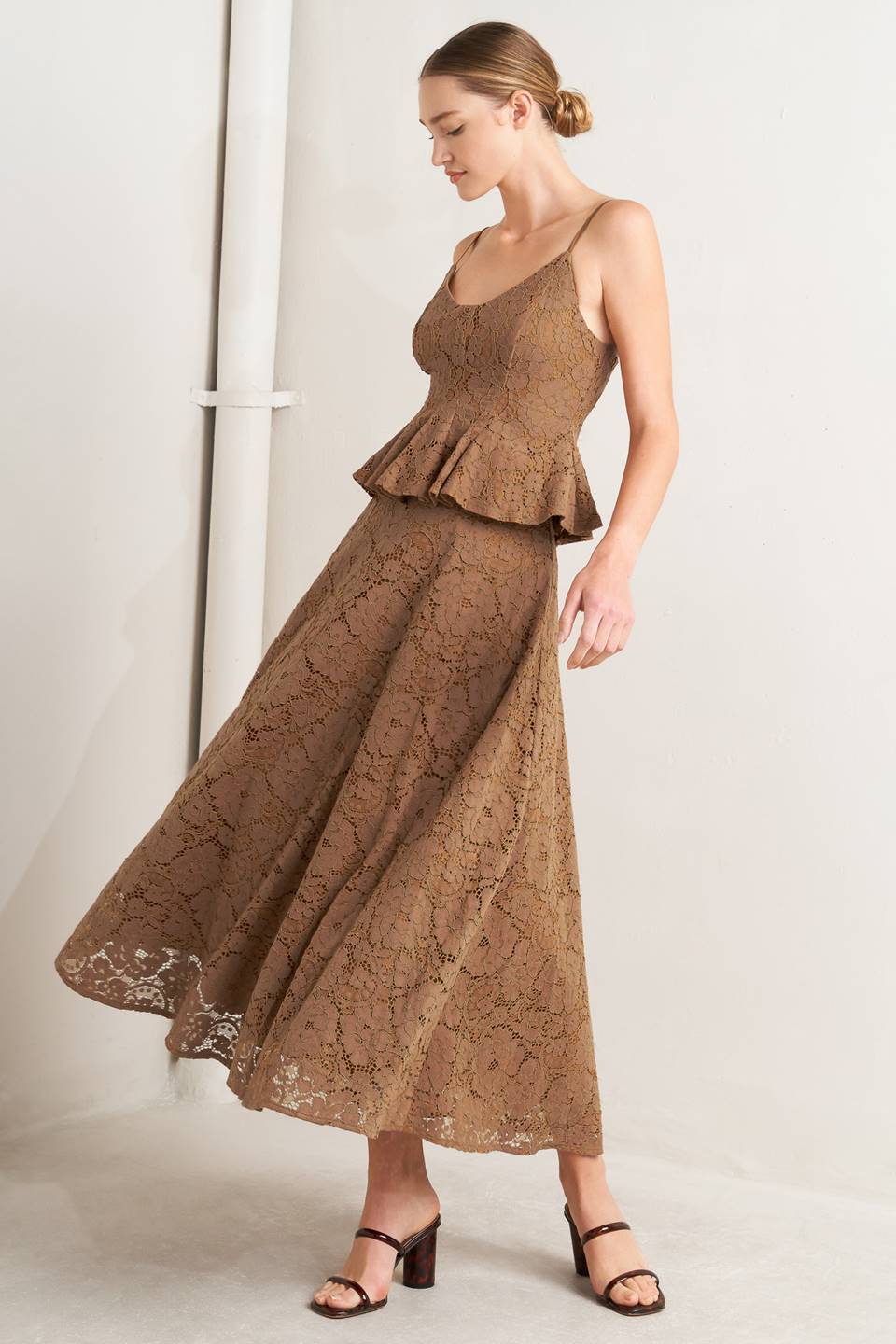 a woman in a brown dress