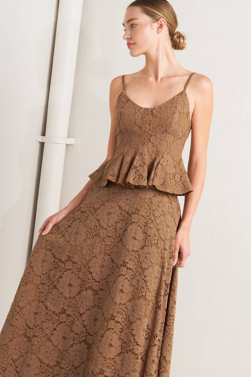 a woman in a brown dress