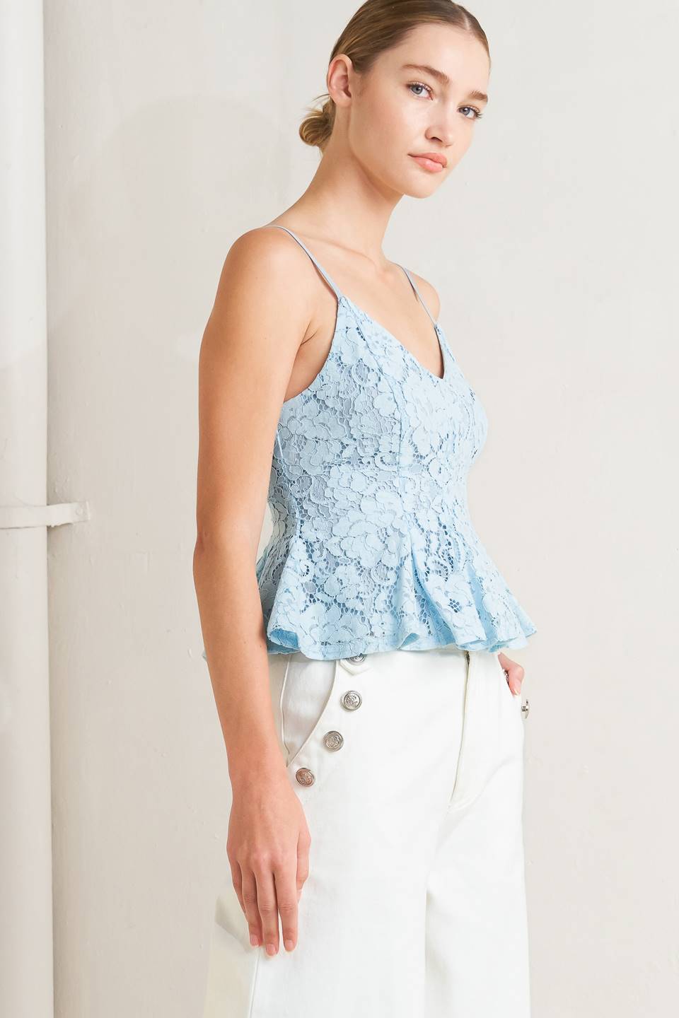 a woman in a blue top