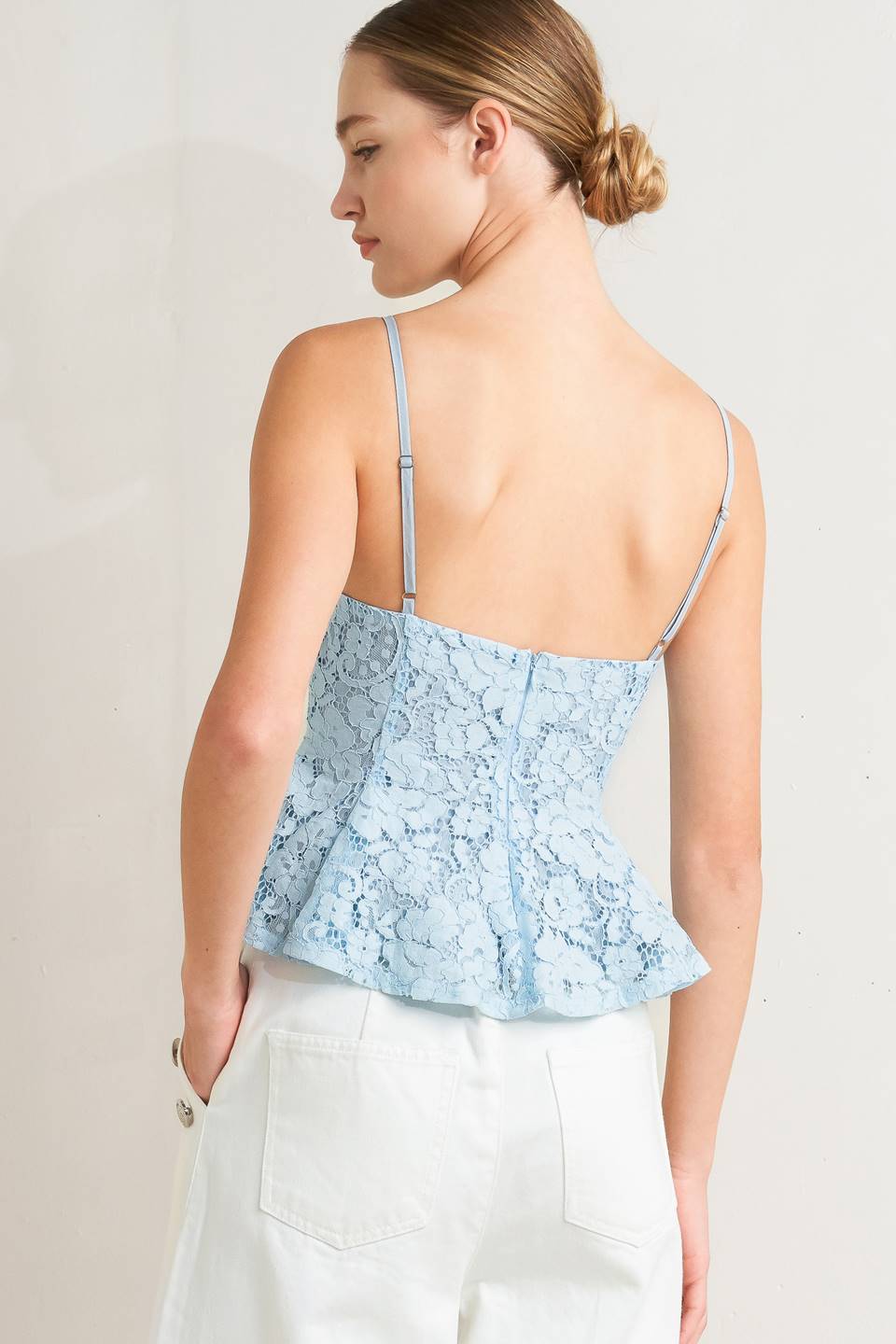 a woman in a blue top