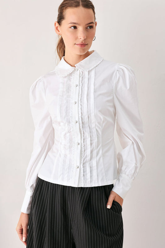 a woman in a white blouse