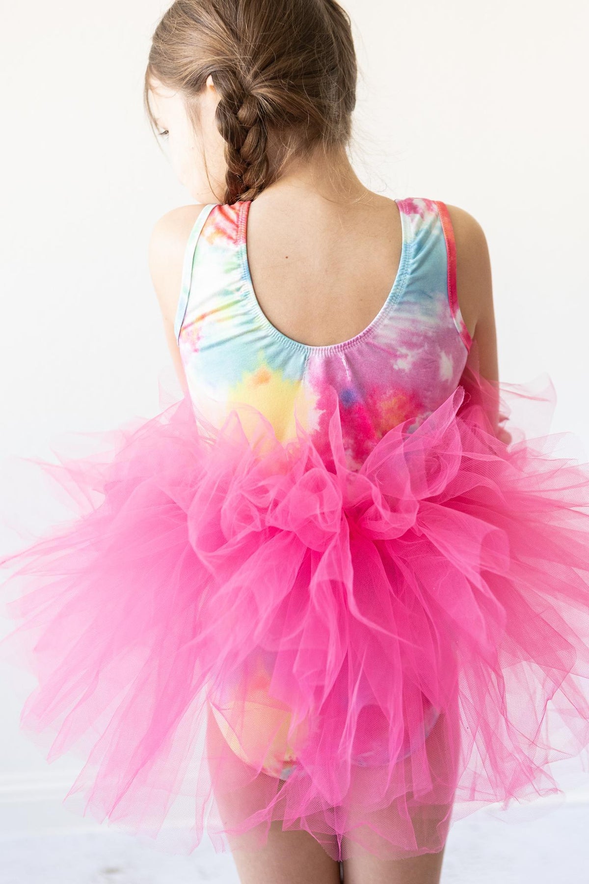 a girl in a pink tutu