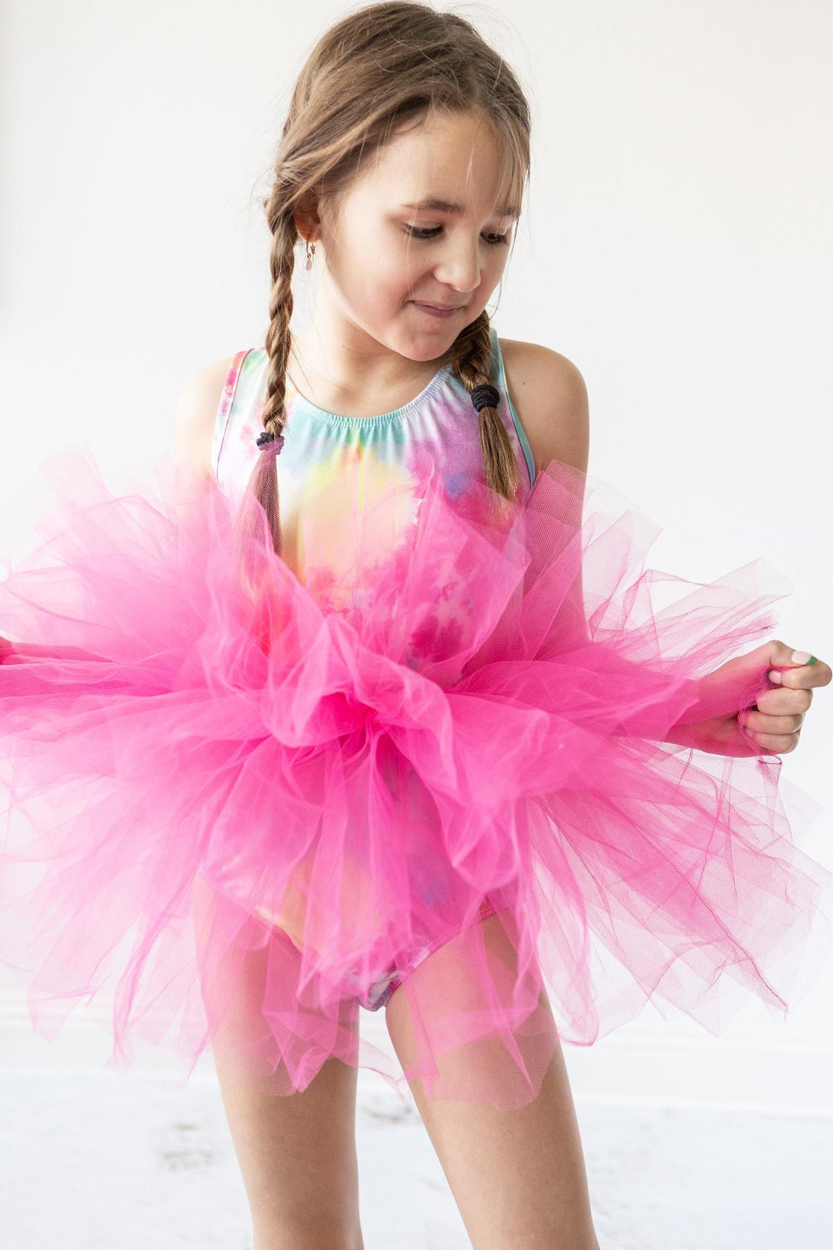 a girl in a pink tutu