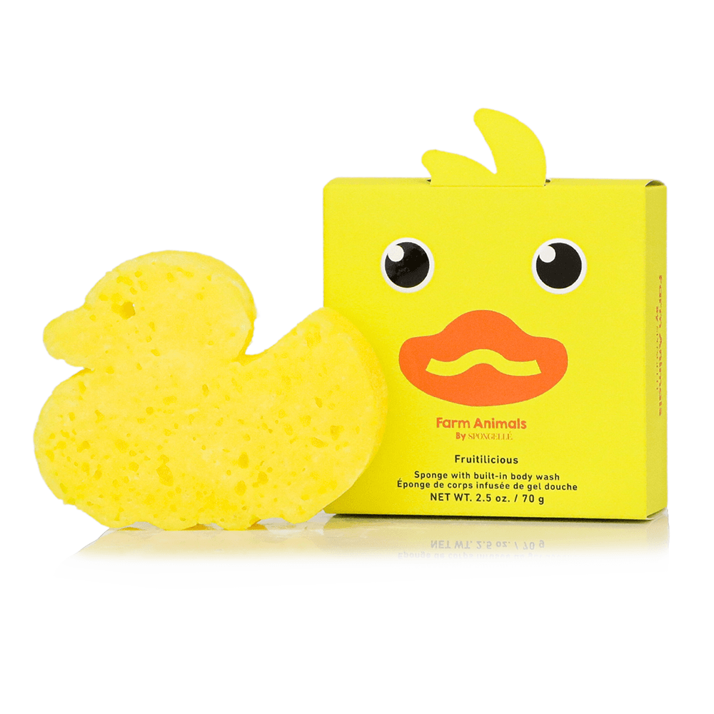 a yellow duck shaped sponge next to a box