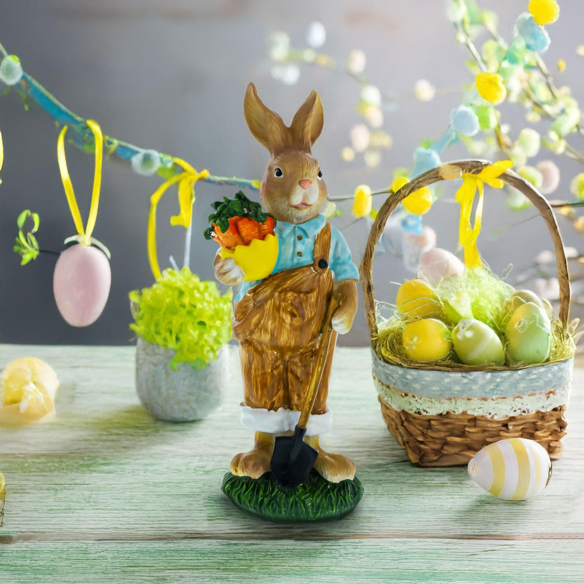 a bunny figurine and basket of eggs