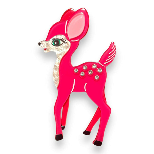 a pink plastic deer with rhinestones