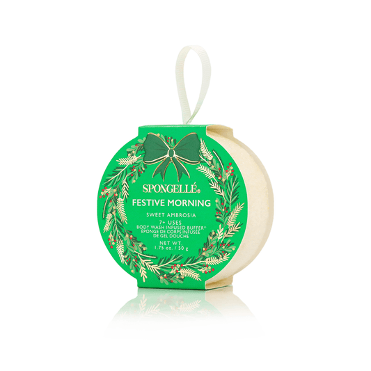 a green and white round object with a ribbon