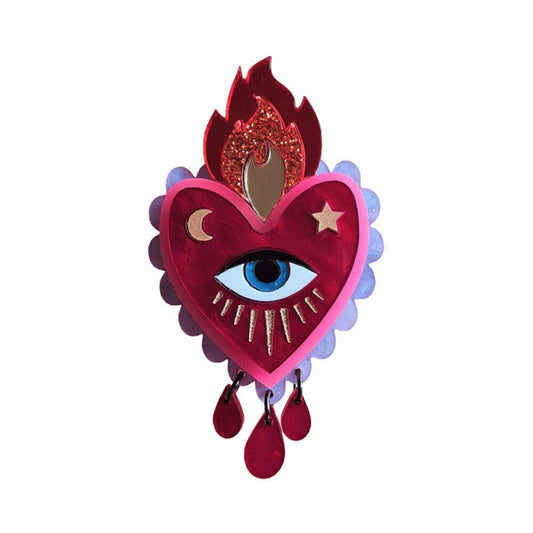 a heart with a eye and flame