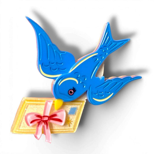 a blue bird with a letter