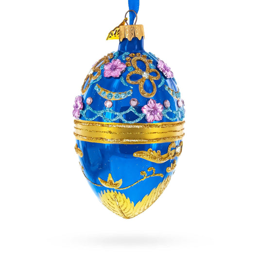 Flowers on Glossy Blue Glass Egg Christmas Ornament 4 Inches