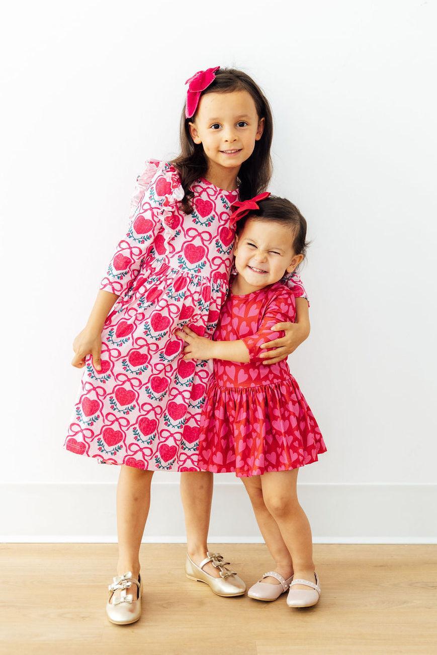 two girls posing for a picture