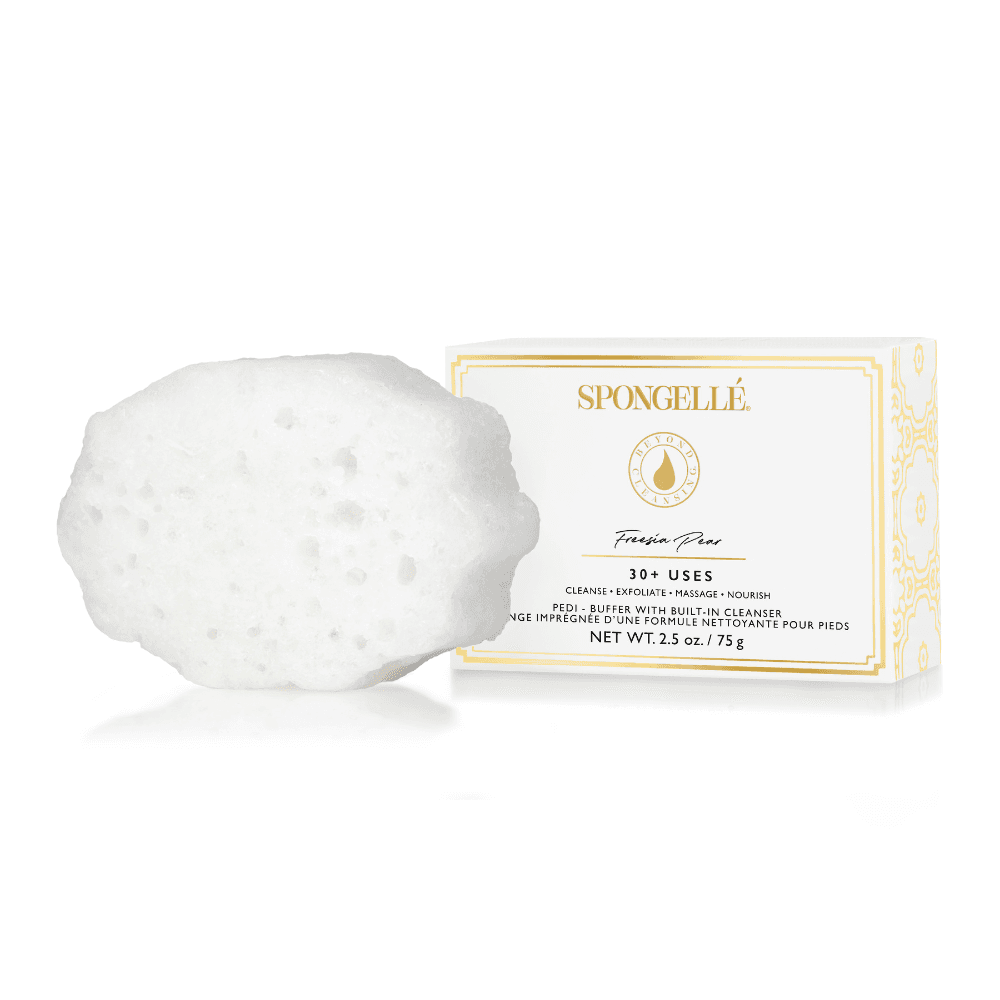 a white sponge next to a box