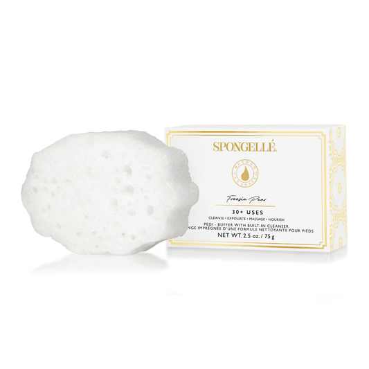 a white sponge next to a box